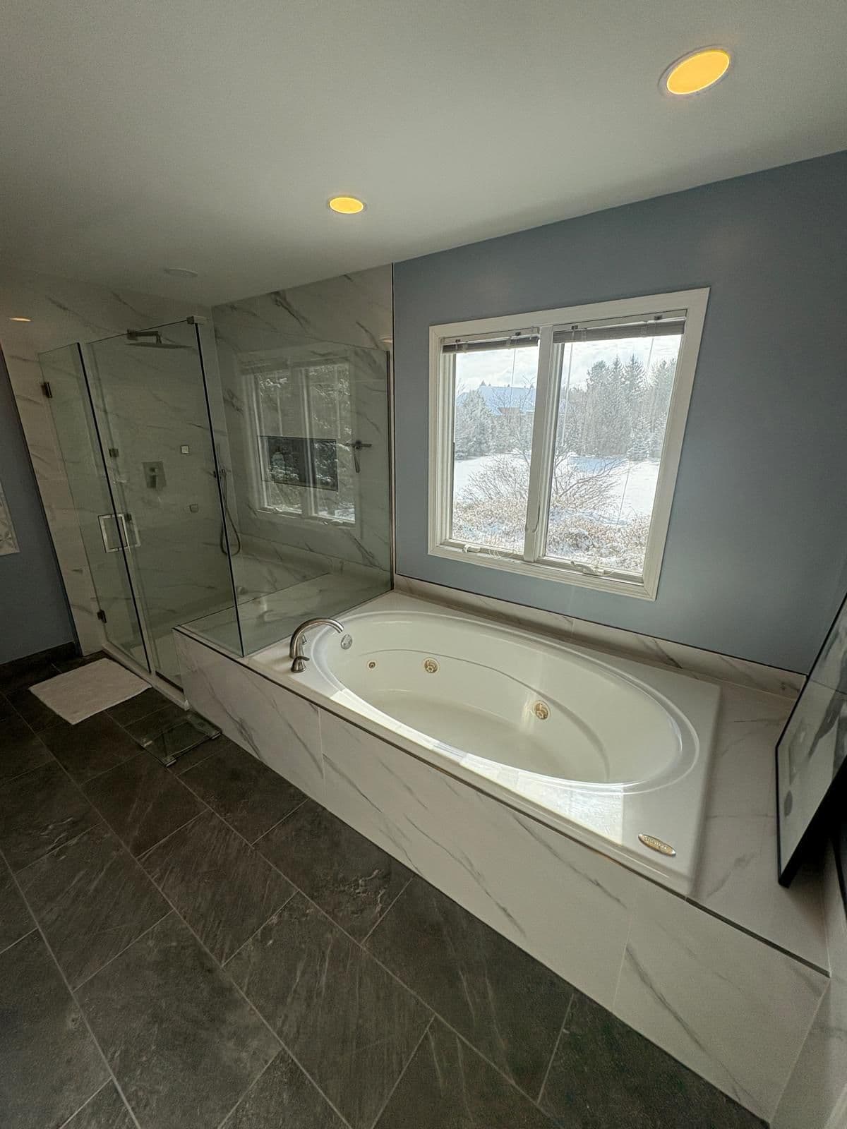 Tub-to-shower conversion in Novi, MI by Stone Works Remodeling