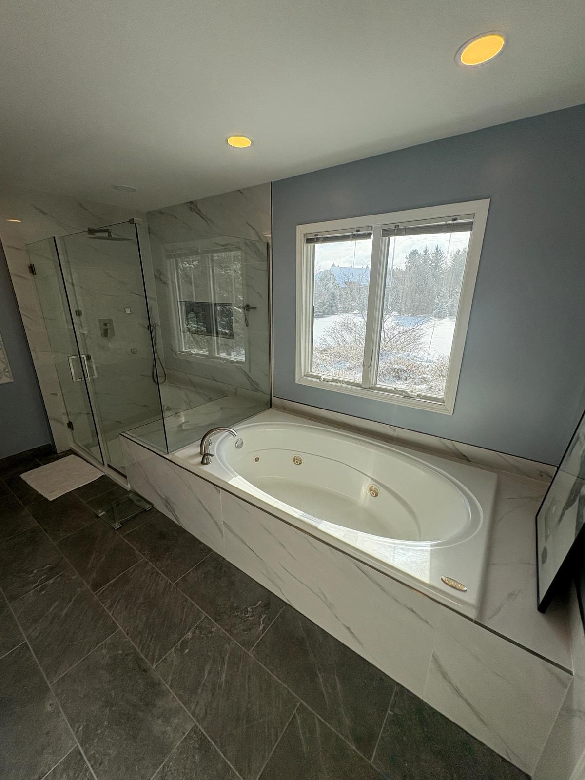 Tub-to-shower conversion in Novi, MI by Stone Works Remodeling